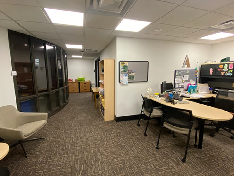 The Marywood Residence Life Office filled with desks and a couch